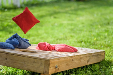 De geschiedenis van het Cornhole spel en de verspreiding ervan in Nederland