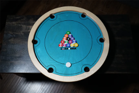 Carrooka Pool 8 Blue rotating board game with 7 solid ,7striped ,1 black coin and 1 acrylic stricker, recycled cotton draw string bag, powder and Instruction Book Size Dia 68 cms Ht 9 cms
